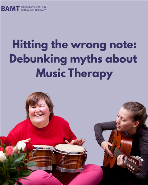 A woman plays the guitar and another woman looks joyful 
